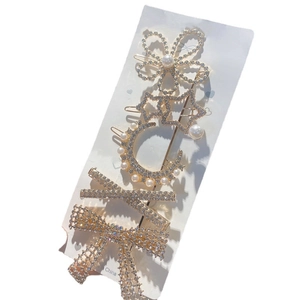 5-piece gold hair clip set with faux pearls, rhinestones, and elegant metal designs