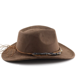 Detail of dark brown faux suede cowboy hat with beaded ethnic rope and fringe accents