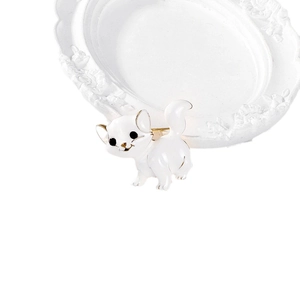 Cute white enamel cat brooch with gold plating on a decorative white relief plate