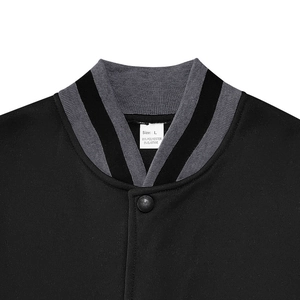 Detail of the striped baseball collar and fabric tag on this black casual jacket