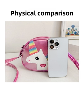 Pink unicorn crossbody bag size comparison with a smartphone for children
