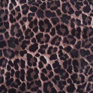 Close-up of the high-quality leopard print fabric texture and intricate pattern details