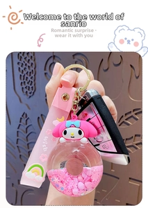 Detail of pink My Melody donut keychain with liquid quicksand and PVC wrist strap