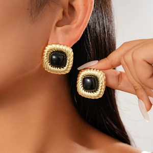 Retro geometric square earrings in gold finish with large black gemstone inserts