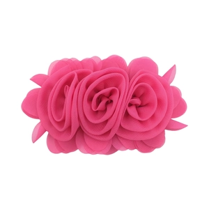 Detailed macro view of three rose chiffon flowers in rose red for children hair accessories