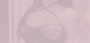 Close-up of black lace Lolita lingerie set with a stylish criss-cross neck design