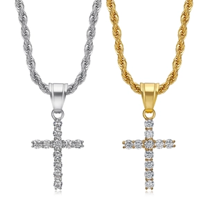 Close-up of gold and silver hip hop cross pendants with 3A zircon pave on rope chains