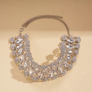 Macro view of silver hollow mesh necklace with marquise crystals and lobster clasp