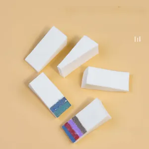 Detail showing white triangular sponges for DIY nail art gradients and ombre effects
