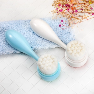 Dual-sided silicone facial brush set in blue and white with soft bristles and ergonomic handle