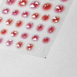 3D embossed nail stickers featuring red blush clouds, white stars, and hearts for DIY manicure