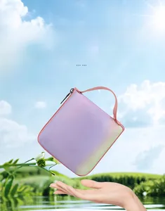 Close-up of portable foldable small storage bag with purple gradient and zipper detail