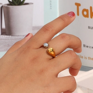 Minimalist stainless steel open ring featuring two-tone gold and silver teardrop beads