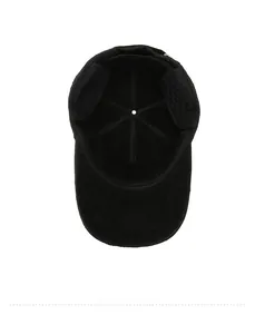 Detail view of the plush fleece lining and quilted ear flaps on the winter baseball cap