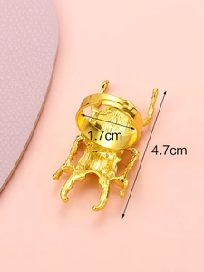 Macro detail of golden beetle ring with 4.7cm length and adjustable open band