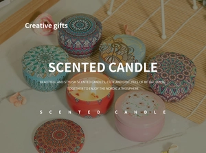 Detailed view of bohemian floral tin candle on a wooden table with rustic background