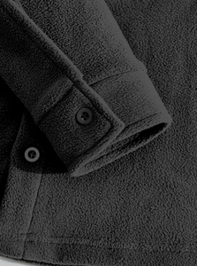 Detail of sleeve cuff button and heavy fleece fabric texture on dark grey men jacket