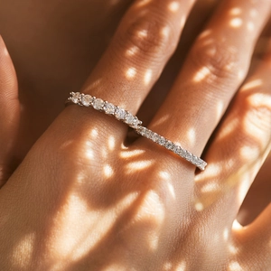 Sparkling D-color Moissanite S925 silver stacked rings for women in sunlight