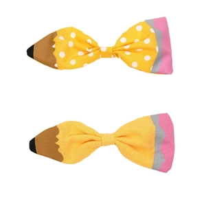 Handmade pencil bow hair clips with yellow polka dots for girls' back to school season
