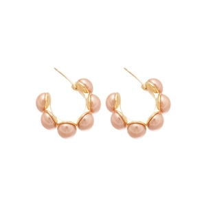 French vintage gold C-shaped hoop earrings with pink pearls on white background