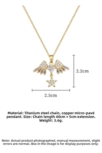 Detailed view of titanium steel gold heart necklace with wing star pavé zircon pendants