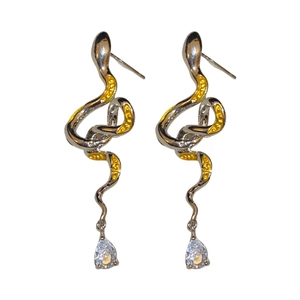Minimalist silver snake drop earrings with yellow enamel and pear-cut crystal charms