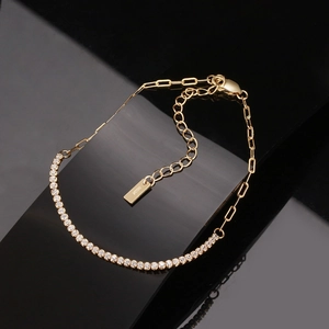 Elegant S925 sterling silver gold bracelet with 4A cubic zirconia on a black background