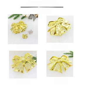 Detailed front and back views of golden Christmas double bells with bow and flower accents