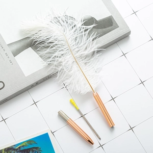 Elegant white ostrich feather ballpoint pen set with rose gold barrel and refill