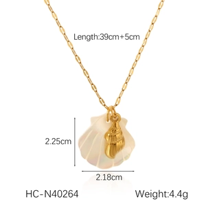 Detail view of 18K gold starfish and seashell necklace with dimensions 2.25x2.18cm