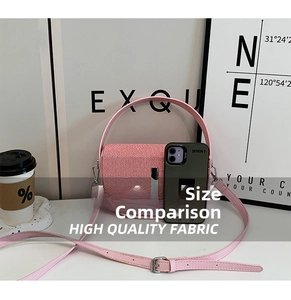 Size comparison of pink semi-circular handbag with textured flap showing a smartphone