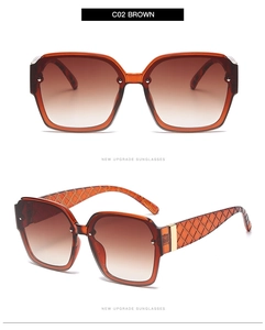 Close-up of brown square sunglasses with diamond lattice temples and gradient lenses