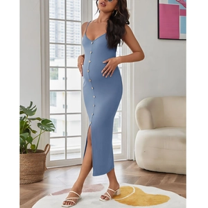 Detail of ribbed knit maternity maxi dress showing side split and button down front in blue