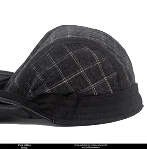 Detailed view of winter cap featuring thick padded cotton lining and grey plaid pattern
