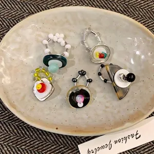 Retro multi-element beaded rings set with resin and faux pearls in vintage style
