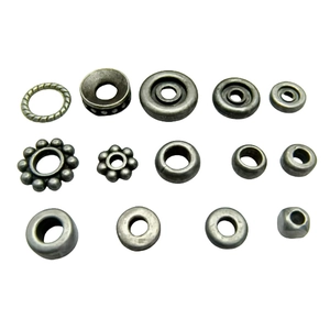Assorted antique silver spacer beads and charms for handmade jewelry and beadwork