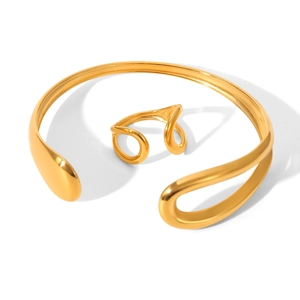 Minimalist gold-plated teardrop bangle and matching open ring set on white background