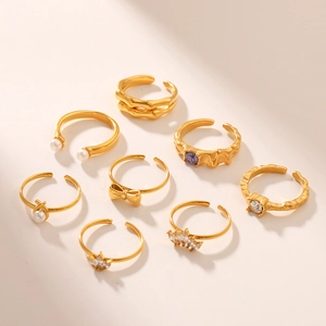 8-piece set of 18K gold-plated stainless steel bow rings with pearls and zircon stones