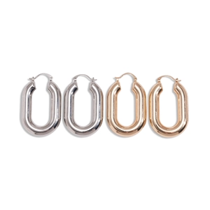 U-shaped oval chunky hoop earrings in polished gold and silver finishes on white background