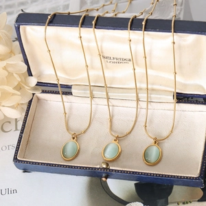 French vintage 18k gold necklace with oval cat eye stone pendant for women