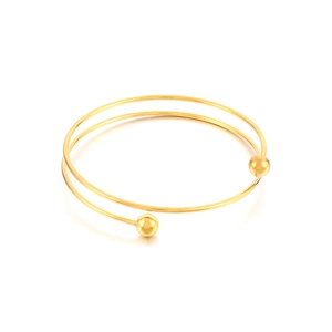 Double-layered gold stainless steel open bangle with minimalist ball detail and metallic finish