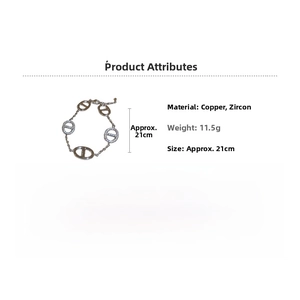 Detail view showing polished silver plated oval chain link bracelet with sparkling zircon stones