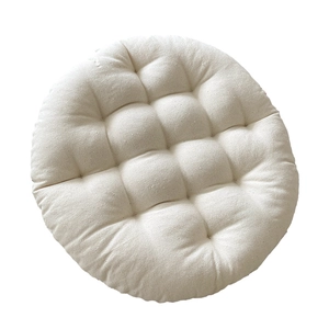 Minimalist off-white round tatami seat cushion with quilted nine-square pattern