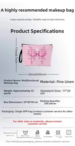 Linen makeup bag detail showing size 25x17cm and pink plaid bow with heart design