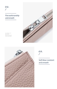 Detail of pink lychee leather texture and fine stitching on a slim zip coin purse