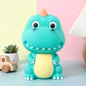 Cute green cartoon dinosaur piggy bank for kids in a cozy nursery room setting
