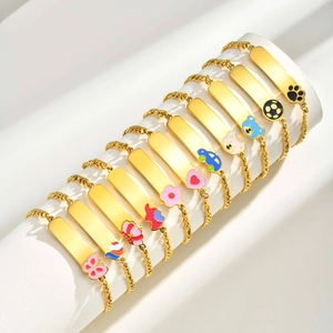Collection of golden stainless steel children's ID bracelets with colorful enamel charms
