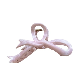 Pink marble texture hair claw clip in a stylish twisted ribbon design for women