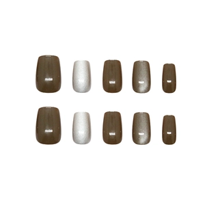 Press-on nails in vintage brown cat eye and silver glitter, short square style
