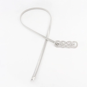 Detailed view of silver metal snake chain belt with decorative triple ring buckle
